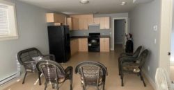 Spacious newly renovated 2 bedroom 1 bath Basement Suite (utilities included water, and hydro)